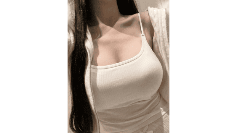 Stripchat Owo-nO showcasing her massive natural breasts and curvy physique that invite intense kneading and erotic appreciation.